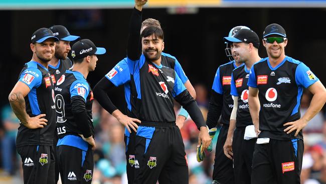 Rashid Khan, middle, will be a must-have in the Strikers’ consecutive double-game rounds. Picture: Darren England/AAP