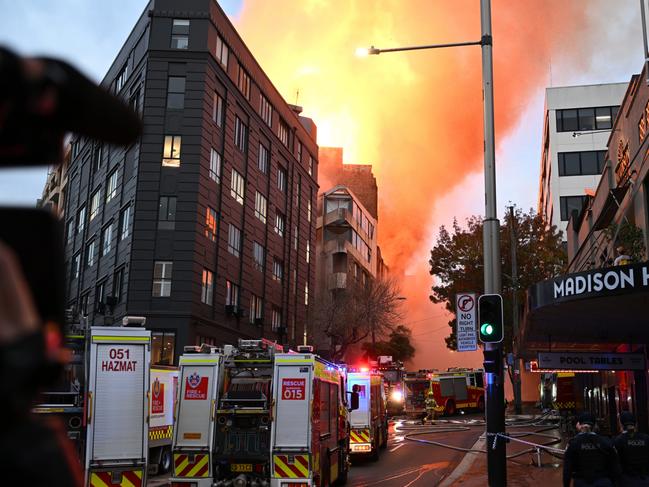 The fire overtakes the building in Surry Hills. Picture: AAP Image/Dean Lewins