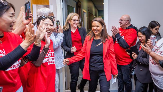 Eden Foster is joined by Premier Jacinta Allan as she enters the Noble Park RSL after her Mulgrave by-election win. Picture: Jake Nowakowski