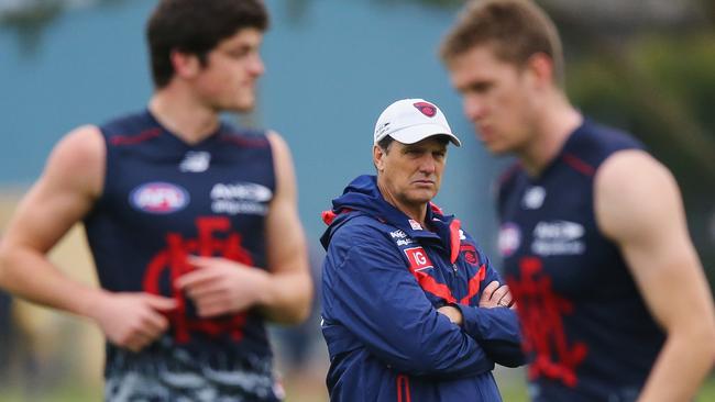 Paul Roos watches Angus Brayshaw and Tom McDonald.