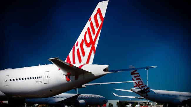 Virgin Australia aircraft parked on the tarmac at Brisbane Airport. Picture: Patrick Hamilton/AFP