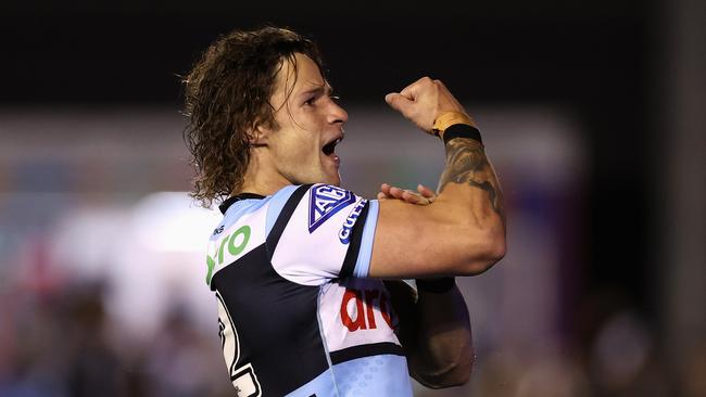 SYDNEY, AUSTRALIA - AUGUST 31: Nicho Hynes of the Sharks celebrates a try that was then disallowed during the round 26 NRL match between Cronulla Sharks and New Zealand Warriors at PointsBet Stadium, on August 31, 2024, in Sydney, Australia. (Photo by Cameron Spencer/Getty Images)