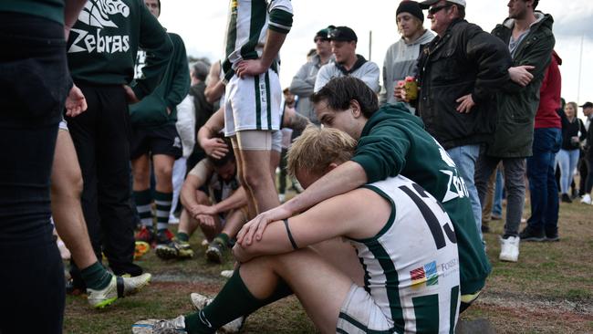 Forest Hill players console each other following the 2016 grand final loss. Picture: Christopher Chan.