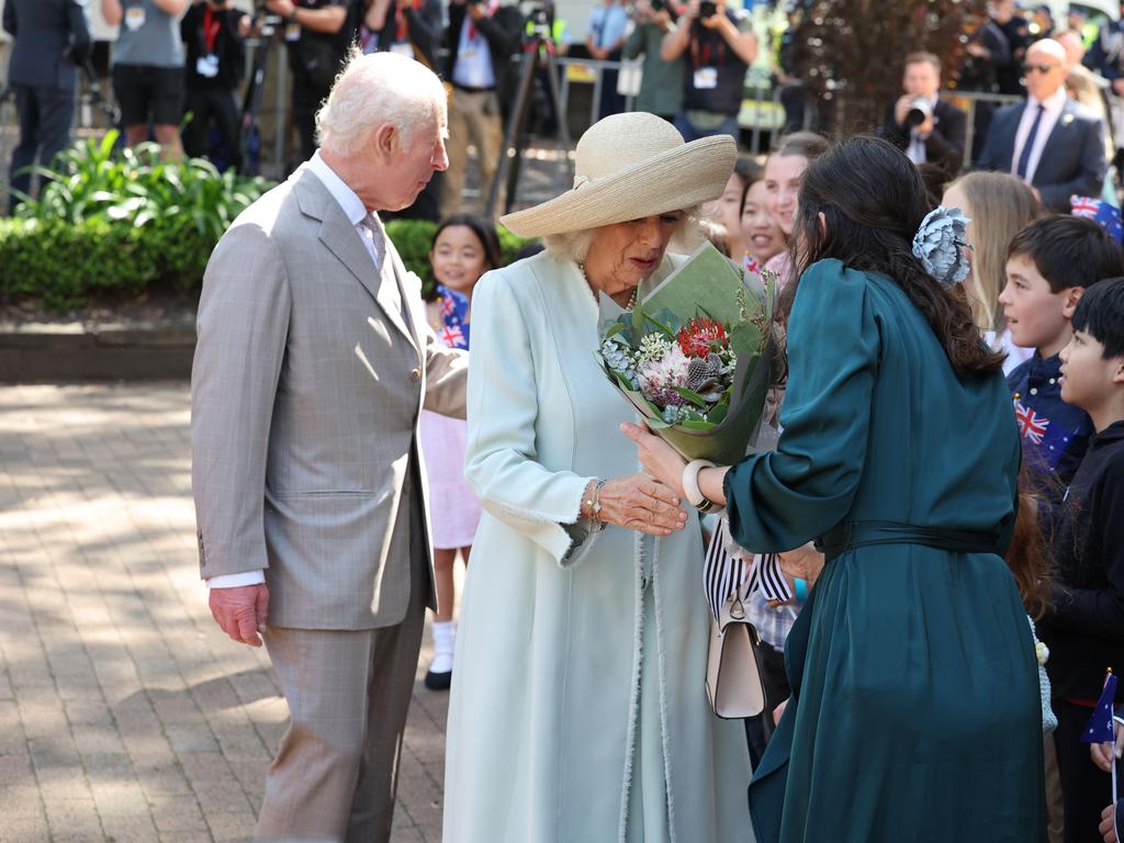 Sunday school kids greet the royals. Picture: Rohan Kelly