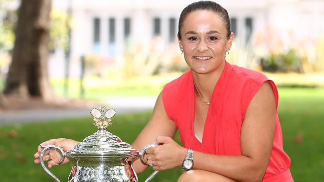 Ash poses with the Daphne Akhurst Memorial Cup on Sunday Picture: Getty Images