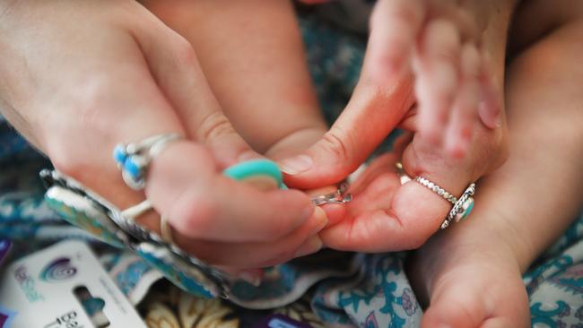 Julie Christie is the inventor of the Nail Snail, a nifty device that trims baby an infant nails with ease. Picture: Scott Powick