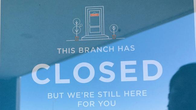 A sign on the ANZ branch door at Beenleigh.