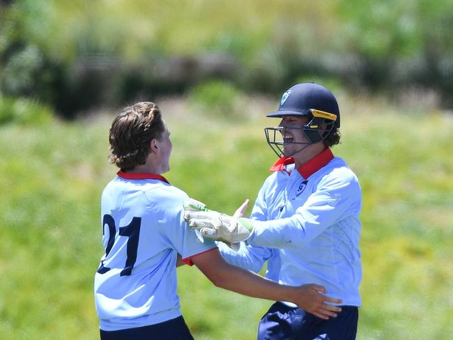 NSW Metro bowler Rafael MacMillan celebrates a wicket with wicketkeeper Ryan Hicks during the grand final at Karen Rolton Oval 22 December, 2022, Cricket Australia U19 Male National Championships 2022-23.Picture: Cricket Australia.