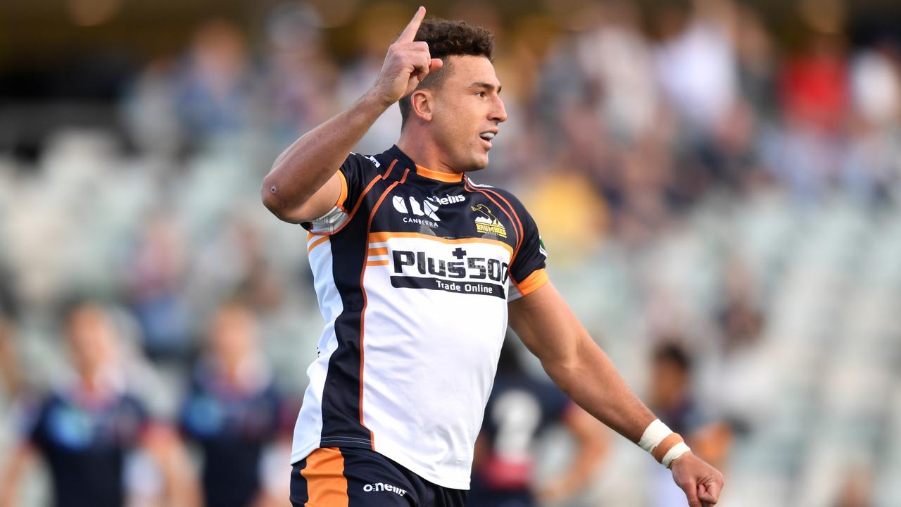 Tom Banks of the Brumbies celebrates after scoring a try.