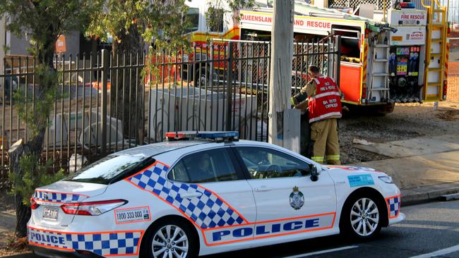 Police and firefighters on scene at Southport State High School on Friday morning. Picture: Luke Mortimer