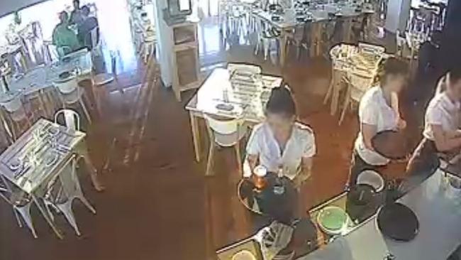 Still image from CCTV at Coast Bar &amp; Restaurant showing work experience girls serving alcohol to patrons. Picture: supplied