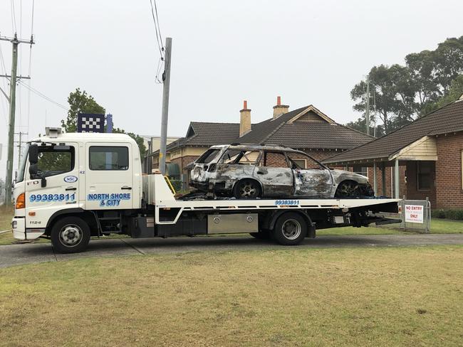 The car police believe was used to ram the elctric fences was towed into the holding lot this morning. Picture: Madeline Crittenden.