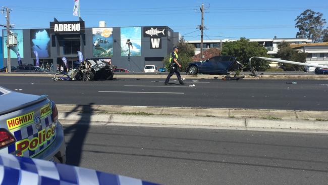 Another section of the car wreckage sits several metres further along the road. Picture: Tamsin Rose