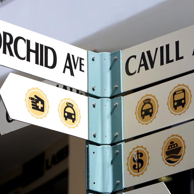 Cavill Avenue, Surfers Paradise which is believed to have the most expensive rent in Australia. Street signpost showing Orchid Ave and Cavill Ave.