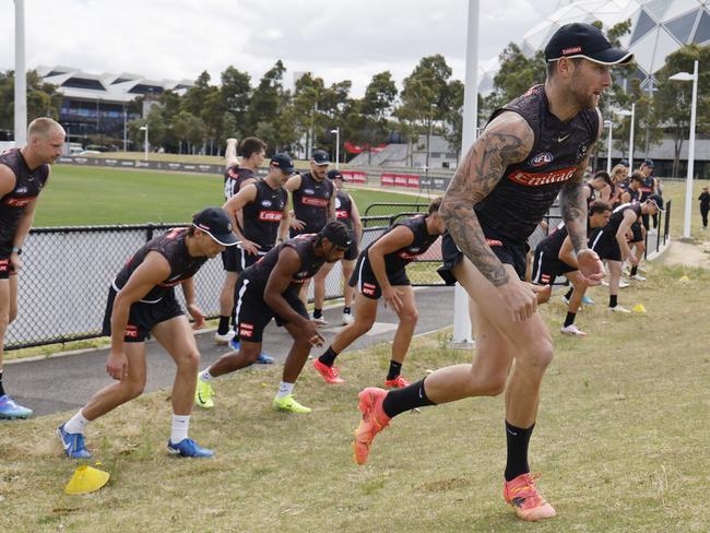 The Magpies get to work. Picture: Michael Klein