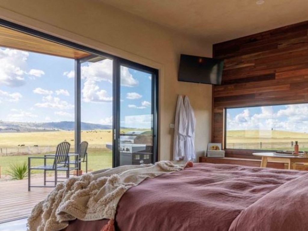 Each cabin has a cosy set up, with ample windows showing off the stunning property.