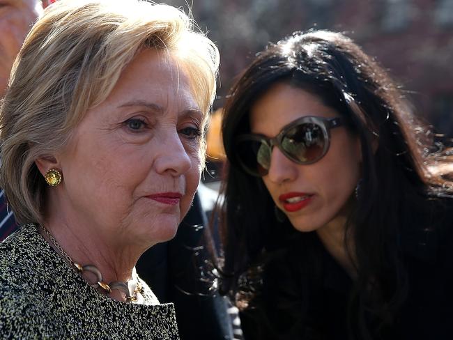 FBI Director James Comey overstated the number of Hillary Clinton (left) emails top aide Huma Abedin (right) forwarded to her husband. Picture: Justin Sullivan/Getty Images