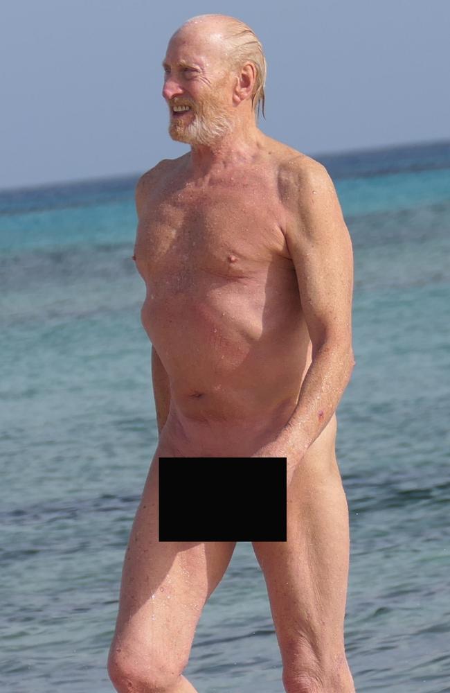Like Heidi Klum, Game of Thrones star Charles Dance clearly believes in the “less is more” approach to swimwear.The 77-year-old dared to bare at a nudist beach while holidaying in Formentera, in Spain, with his girlfriend, Alessandra Masi in May. Picture: Cobra Team/Backgrid