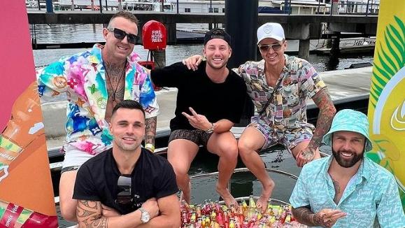 Troy Williams (bottom right) tries his new drink, GeeUp, on mates. Picture: Instagram