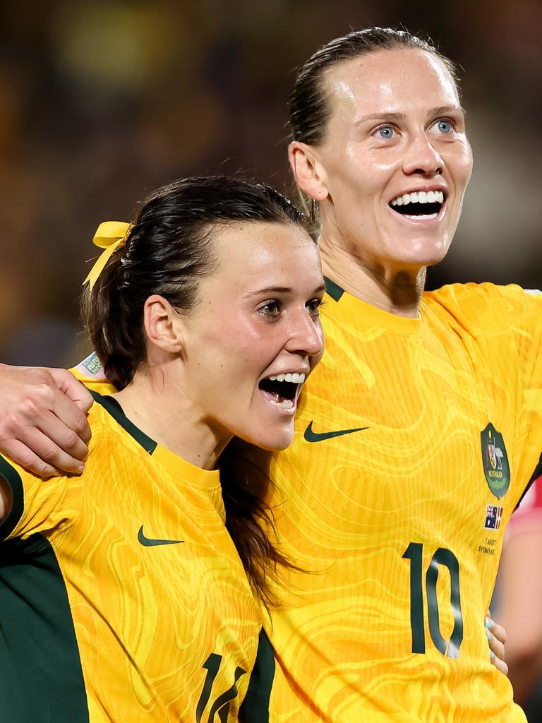 Hayley Raso celebrates her goal with Emily van Egmond. Picture: Damian Briggs/Speed Media/Icon Sportswire via Getty Images