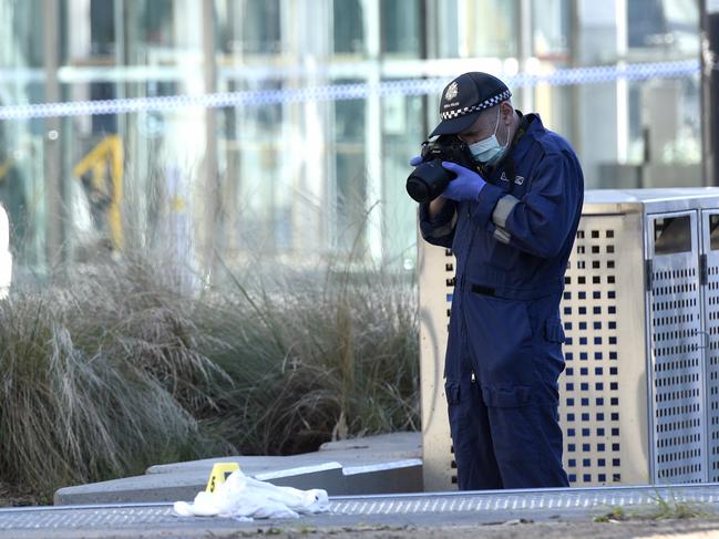 MELBOURNE, AUSTRALIA - NewsWire Photos MARCH 13, 2022: Police investigate at the scene of an overnight homicide on Bourke Street in Melbourne's Docklands. Picture: NCA NewsWire / Andrew Henshaw