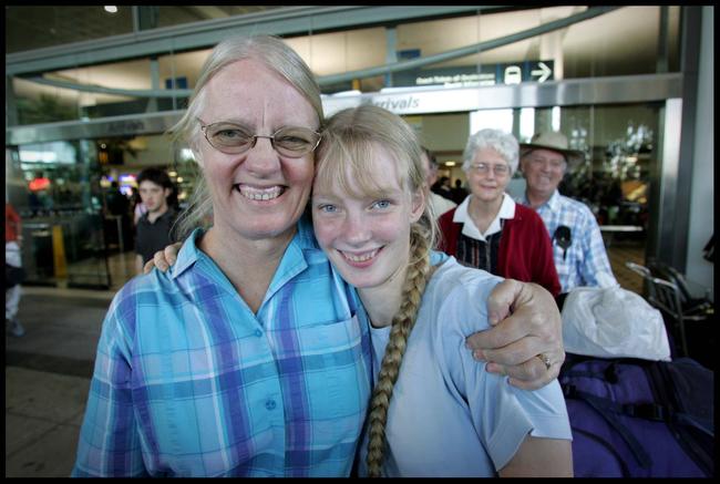 Gladys Staines with Esther arriving at Brisbane International Airport in 2004.