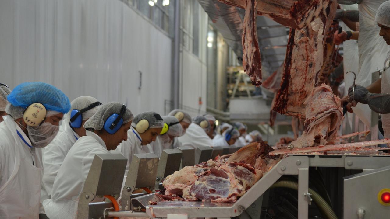 Workers in Oakey Beef Exports boning and packing room. The site is one of the town’s largest employers.