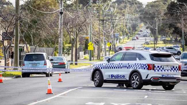 A massive police presence has swarmed Corrigan Rd. Picture: Jake Nowakowski