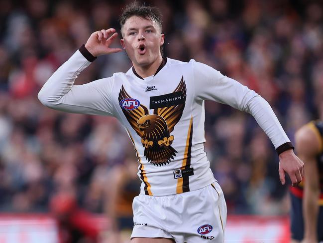 Jack Ginnivan celebrates in front of Crows fans. Picture: Getty Images