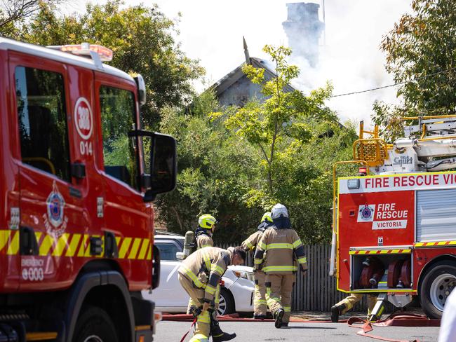 The rear of the home was fully alight when fire crews arrived. Picture: Mark Stewart