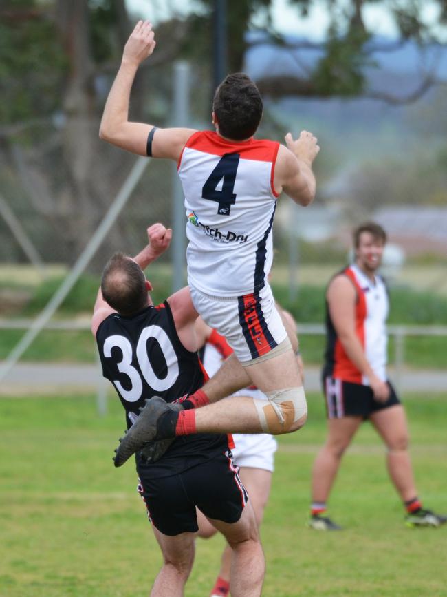 Flagstaff Hill's Daniel Butcher up for a mark against Christies Beach. Picture: AAP/Brenton Edwards