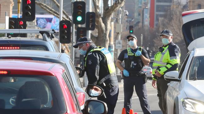 Police are checking cars and pedestrians in the city in an attempt to disrupt the anti-lockdown protest expected today in the Melbourne CBD. Picture: David Crosling