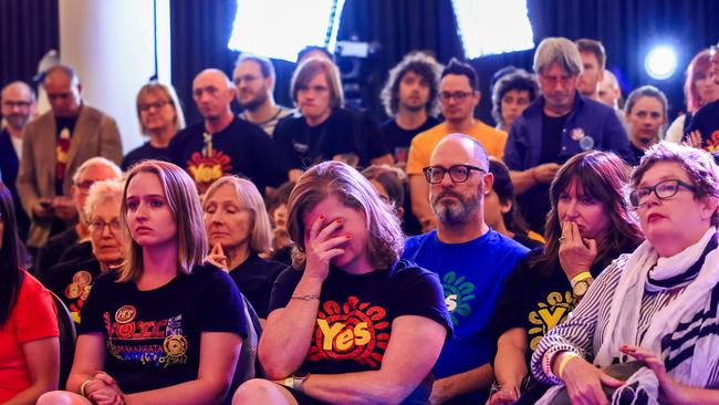 A woman reacts during a speech by Campaign Director of Yes 23 Dean Parkin following the defeat of the voice