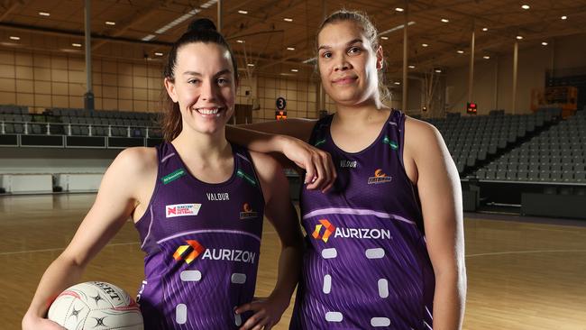 Ruby Bakewell-Doran and Donnell Wallam have re-signed with the Firebirds. Picture: Liam Kidston