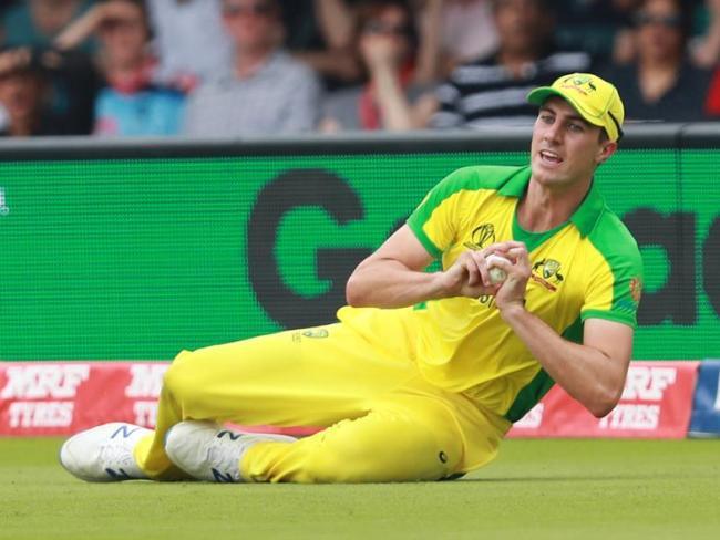 Pat Cummins took a fine catch in the deep to remove England captain Eoin Morgan.