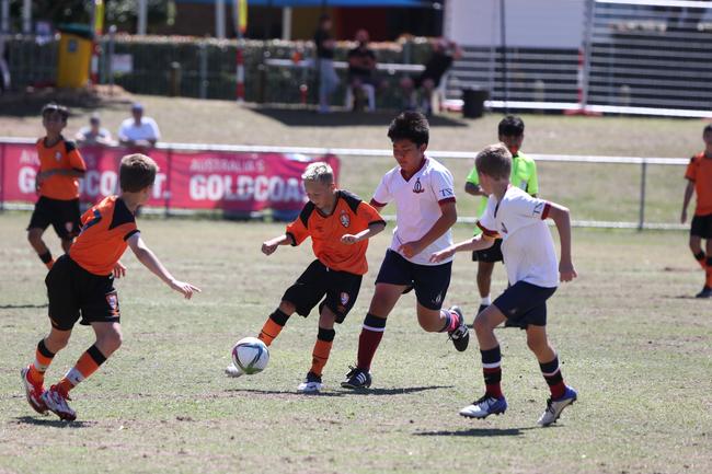 The Premier Invitational football tournament on the Gold Coast. TSS v Brisbane Roar under-13s in action. Picture: Mike Batterham.
