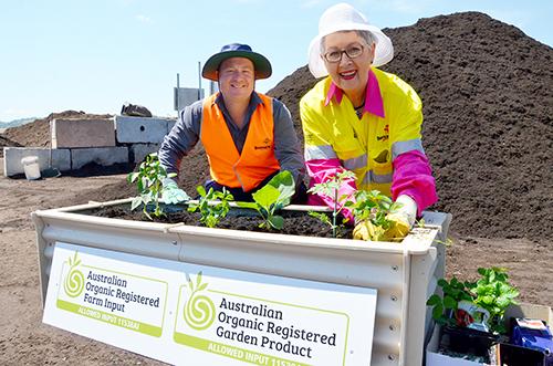 Mayor Jenny Dowell and Waste Operations Coordinator Kevin Trustum planting a vegetable garden using the certified organic compost. Picture: Contributed