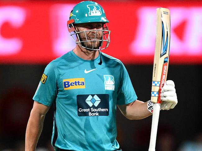 BRISBANE, AUSTRALIA - DECEMBER 27: Chris Lynn of the Heat celebrates his half century during the Men's Big Bash League match between the Brisbane Heat and the Melbourne Stars at The Gabba, on December 27, 2021, in Brisbane, Australia. (Photo by Bradley Kanaris/Getty Images)