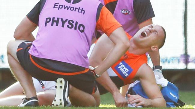 Tom Scully after injuring his ankle.