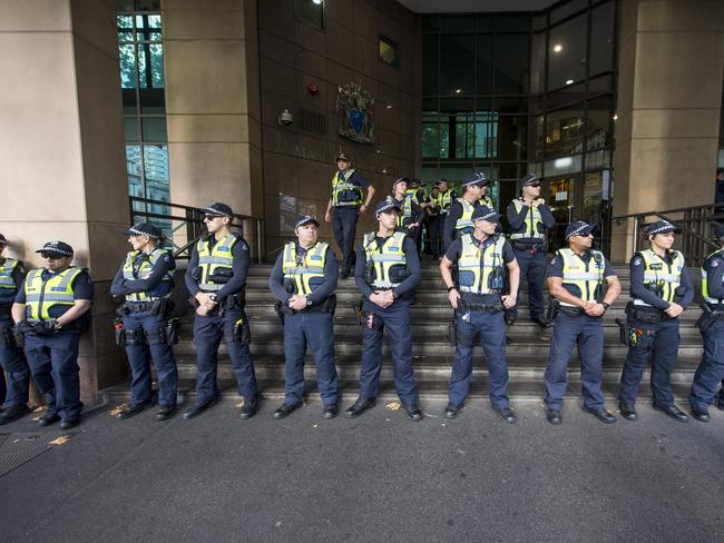 A large police presence at the Melbourne Magistrates Court. Picture: Eugene Hyland