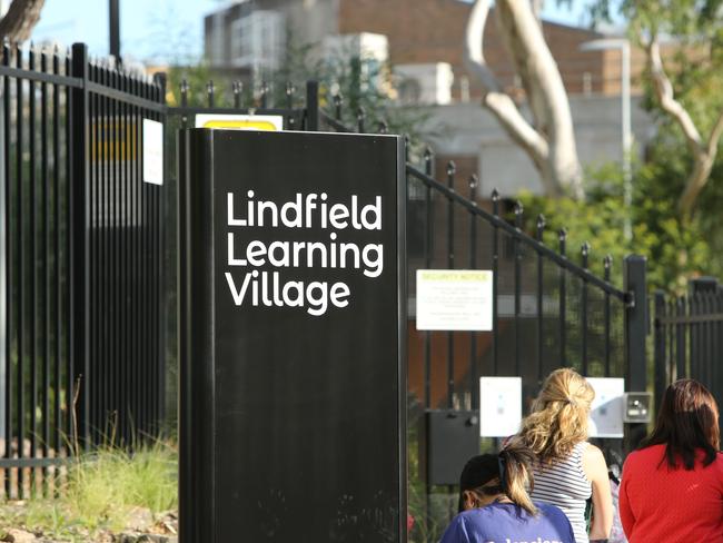 DAILY TELEGRAPH - Pictured is Lindfield Learning Village today where Primary School classes are displaying student-made posters in emblazoned with the words ``stop killer cops" and "pigs out of the country". Picture: Tim Hunter.