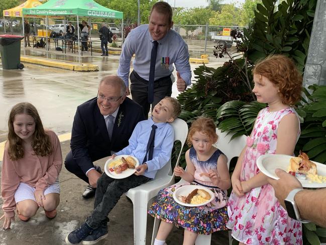 Mr Morrison caught the Brown family by surprise at Townsville RSL breakfast following the dawn service. Picture: Supplied