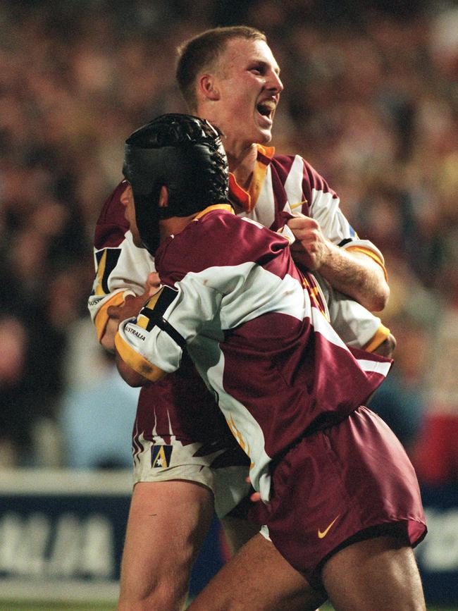 Steve Renouf and Darren Lockyer after the 1st Broncos try during Super League grand final at ANZ stadium in 1997.