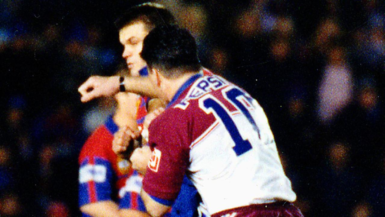Former Manly forward Mark Carroll fighting with Newcastle Paul Harragon in 1995.