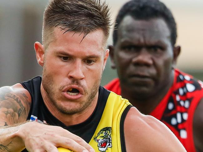 Nathan Brown (ball) as Nightcliff V Tiwi at TIO Stadium .Pic Glenn Campbell