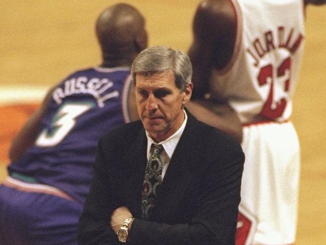 7 Jun 1998: Head Coach Jerry Sloan of the Utah Jazz looks at his team as Michael Jordan #23 of the Chicago Bulls keeps the ball away from Bryon Russell #3 of the Jazz during the NBA Finals game 3 at the United Center in Chicago, Illinois. The Bulls defe