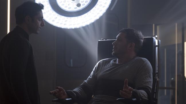 Riz Ahmed and Tom Hardy in a scene from film VENOM