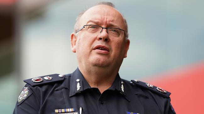 Chief Commissioner of Victoria Police, Graham Ashton says police are ramping up checks on those who are supposed to be self-isolating. Picture: AAP