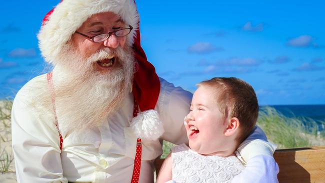 Paige Skarratts with Santa. Photo: Naturally Creative Photography