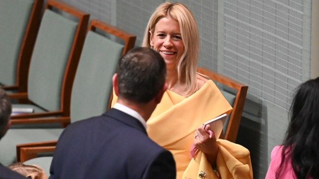 Treasurer Jim Chalmers' wife Laura stunned in a Carla Zampatti outfit as she supported her husband on budget night on Tuesday. Picture: NCA NewsWire / Martin Ollman